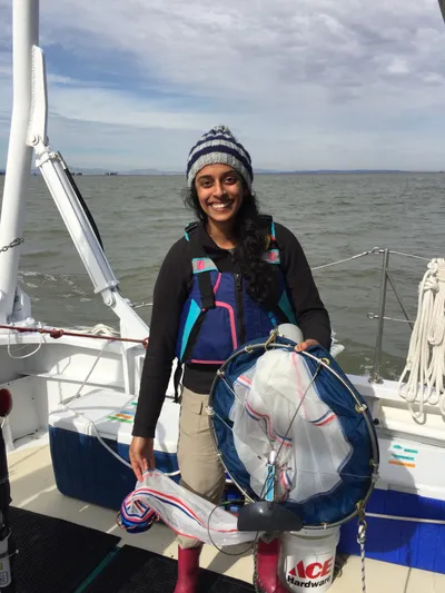 Student collecting plankton samples on R/V Questuary